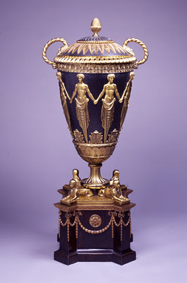 1509230369-Below-Fabulous-gilt-and-black-metal-open-backed-vase-for-an-unknown-use-at-Kedleston-Hall-Derby-possibly-a-plate-warmer-probably-by-James-Stuart-1760-made-by-Diederich-Nicolaus-Anderson-Photo-National-Trust-3.jpg
