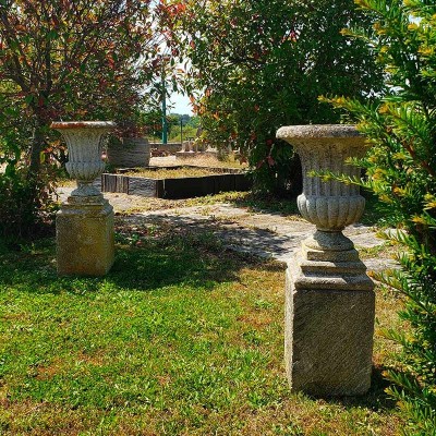 Pair of antique stone Medicis urns