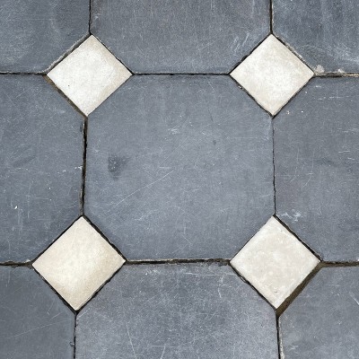 Antique marble floor with black corner squares