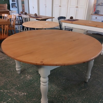 Refurbished circular old pine dining table on 4 turned legs