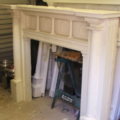 A grand neo classical painted late Victorian chimneypiece