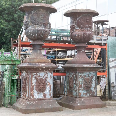 Pair of Monumental Cast Iron Urns on Plinths