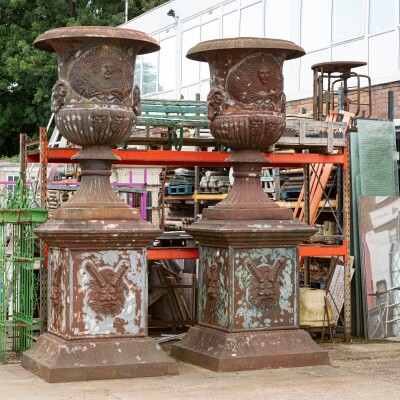 Pair of Monumental Cast Iron Urns on Plinths