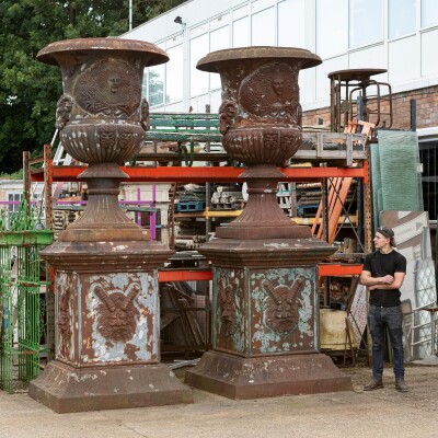 Pair of Monumental Cast Iron Urns on Plinths