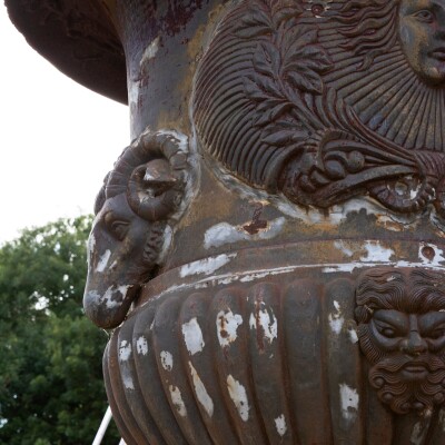 Pair of Monumental Cast Iron Urns on Plinths
