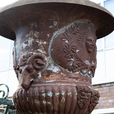 Pair of Monumental Cast Iron Urns on Plinths