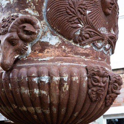 Pair of Monumental Cast Iron Urns on Plinths