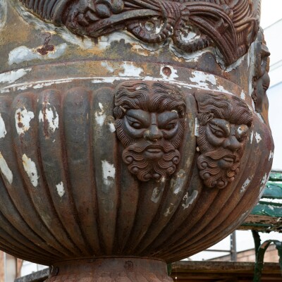 Pair of Monumental Cast Iron Urns on Plinths