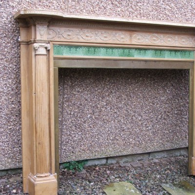 A fine pine and gesso chimneypiece.