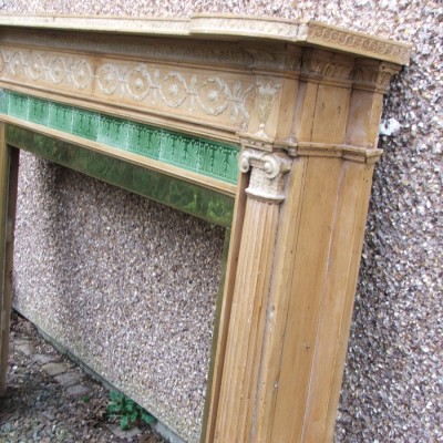 A fine pine and gesso chimneypiece.