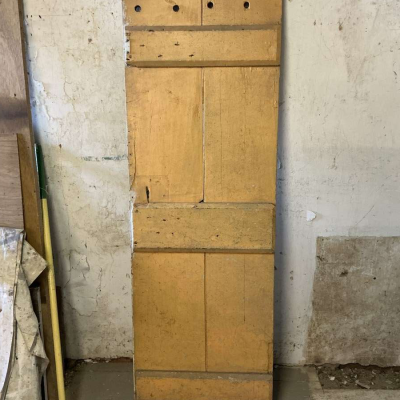 Ledged Cupboard Door, Two Plank, 18th/19th Century. 67” x 21.75”.