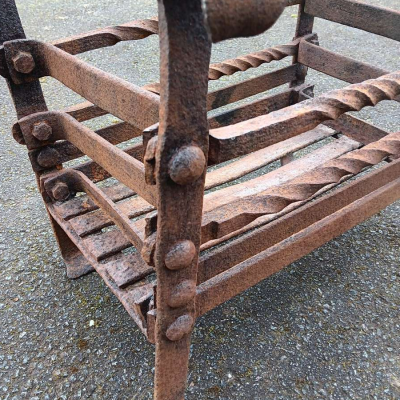 Early wrought iron fire basket