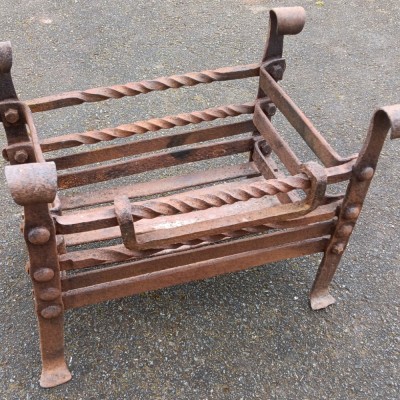 Early wrought iron fire basket