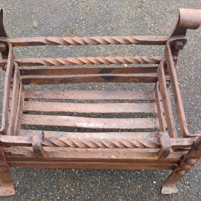 Early wrought iron fire basket