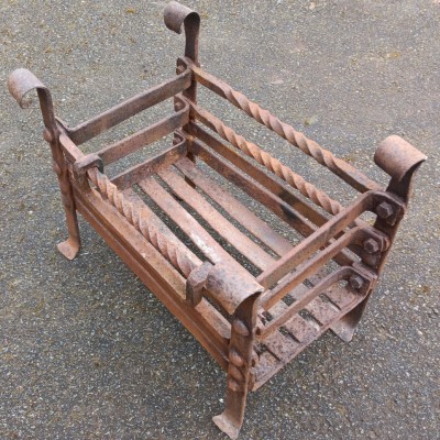 Early wrought iron fire basket