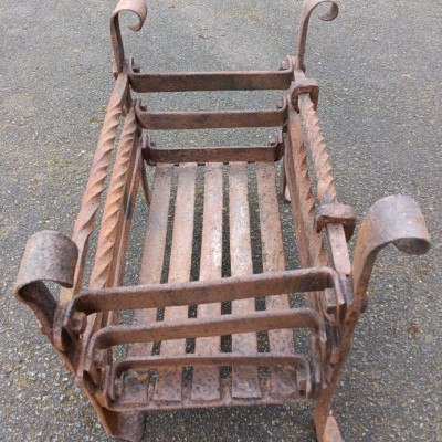 Early wrought iron fire basket