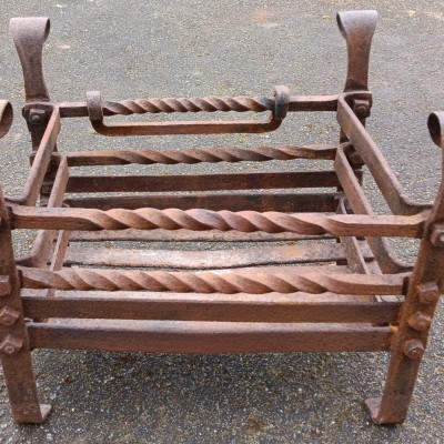 Early wrought iron fire basket
