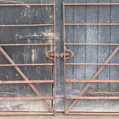 Matching pair of  large single antique wrought iron estate gates