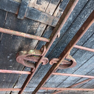 Matching pair of  large single antique wrought iron estate gates