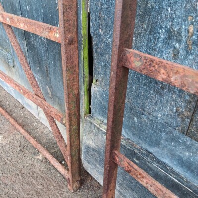 Matching pair of  large single antique wrought iron estate gates