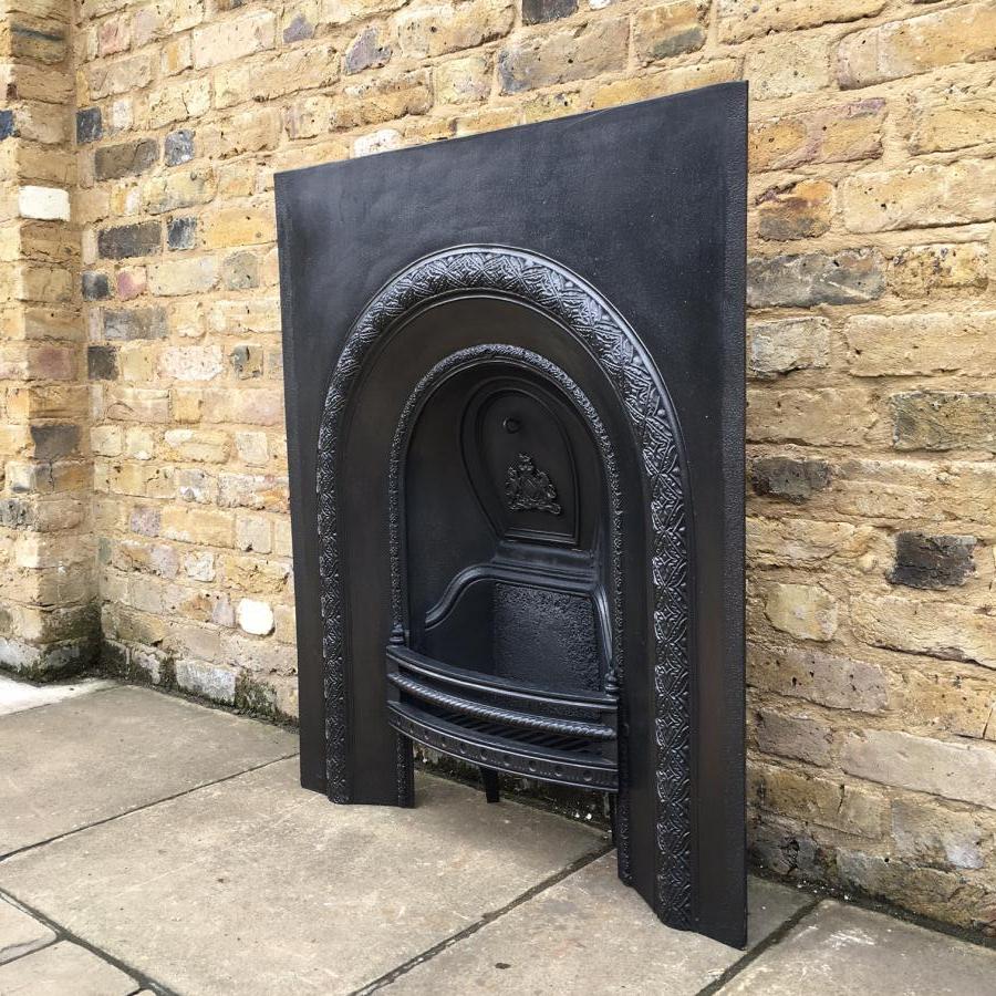 A vintage Victorian cast iron fire V&V Reclamation