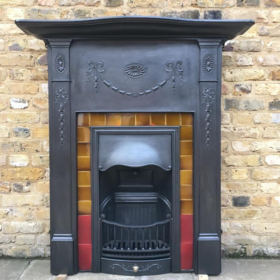 A Victorian cast iron fireplace