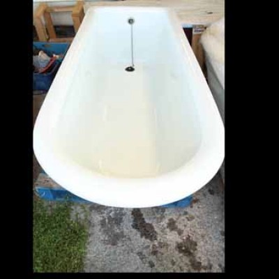 Reclaimed fireclay bath of generous proportions